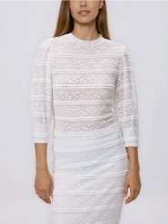 Bluzka z koronką - biały. Białe bluzki Reserved, l, bez wzorów, z dzianiny, bez kołnierzyka, bez ramiączek. Za 109.99 zł.