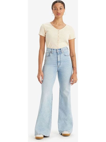 Levi's Dżinsy - Bootcut fit - w kolorze błękitnym rozmiar: W27/L30. Niebieskie jeansy Levi's, l, z aplikacjami, klasyczne, z podwyższonym stanem. Za 254.14 zł.