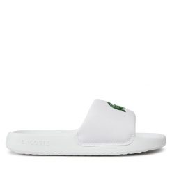 Klapki Lacoste. Białe klapki Lacoste, bez wzorów, bez obcasa, bez zapięcia. Za 169.99 zł.