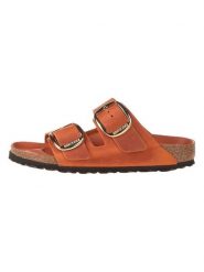 Birkenstock Skórzane klapki w kolorze pomarańczowym rozmiar: 36. Pomarańczowe klapki Birkenstock, bez wzorów, klasyczne, z otwartym noskiem, bez obcasa, bez zapięcia. Za 494.95 zł.