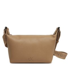 Torebka Calvin Klein Jeans. Szare listonoszki Calvin Klein Jeans, bez wzorów, z jeansu, bez dodatków. Za 259.99 zł.