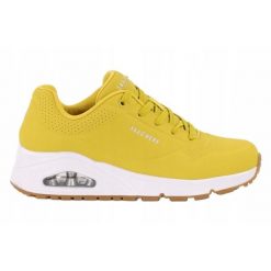 Buty na co dzień damskie SKECHERS UNO STAND ON AIR. Żółte buty sportowe lifestyle Skechers, bez wzorów, ze skóry, bez zapięcia, trekkingowe, skechers sport. Za 249.00 zł.