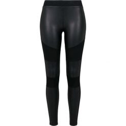 Legginsy miejskie klasyczne sztuczna skóra. Czarne legginsy Urban Classics, bez wzorów, z dżerseju, klasyczne. Za 127.50 zł.
