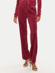 Juicy Couture Spodnie dresowe Tina JCAPW045 Czerwony Regular Fit. Czerwone spodnie dresowe Juicy Couture, bez wzorów, z dresówki. Za 219.99 zł.