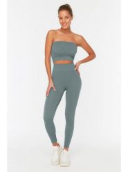 Trendyol Legginsy w kolorze turkusowym rozmiar: M/L. Niebieskie legginsy Trendyol, bez wzorów, prążkowane. Za 52.99 zł.