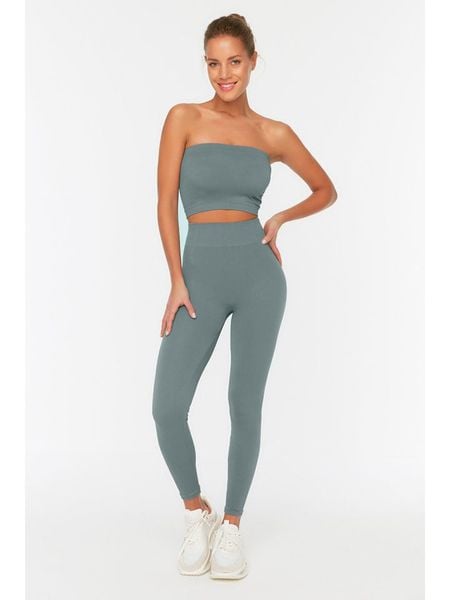 Trendyol Legginsy w kolorze turkusowym rozmiar: M/L. Niebieskie legginsy Trendyol, bez wzorów, prążkowane. Za 52.99 zł.