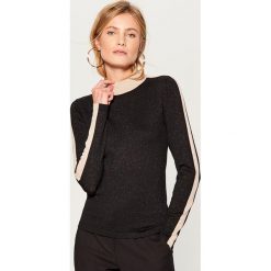 Dopasowany sweter z golfem - Czarny. Swetry marki INESIS. W wyprzedaży za 59.99 zł.