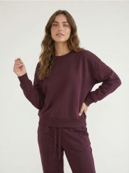 Dresowa bluza crewneck basic - fioletowy. Fioletowe bluzy bez kaptura Sinsay, l, bez wzorów, z dresówki, bez kaptura. Za 35.99 zł.