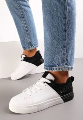 Biało-Czarne Sneakersy Sznurowane na Płaskiej Grubszej Podeszwie z Cyrkoniami Hanuel. Białe buty sportowe lifestyle Renee, bez wzorów, klasyczne, bez zapięcia. W wyprzedaży za 47.99 zł.