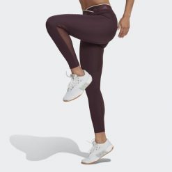 Damskie elastyczne legginsy w kształcie litery V adidas Techfit. Czerwone legginsy adidas, bez wzorów, sportowe. Za 213.15 zł.