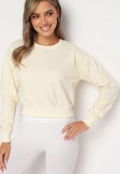 Jasnobeżowa Bluza z Dodatkiem Bawełny Wykończona Ściągaczami Evilaya. Brązowe bluzy Born2be, l, bez wzorów, z bawełny, bez kaptura. W wyprzedaży za 21.24 zł.