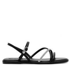 Sandały Nine West. Czarne sandały Nine West, bez wzorów, bez obcasa, na płaskiej podeszwie, bez zapięcia. Za 219.99 zł.