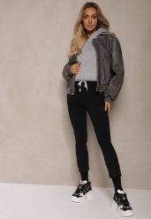 Czarne Spodnie z Dodatkiem Bawełny High Waist Wiązane w Pasie Nirinne. Czarne jeansy Renee, m, bez wzorów, z bawełny, z podwyższonym stanem. W wyprzedaży za 39.99 zł.