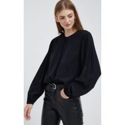 Sisley bluzka damska kolor czarny gładka. Czarne bluzki Sisley, l, bez wzorów, bez kołnierzyka, bez ramiączek. W wyprzedaży za 199.99 zł.