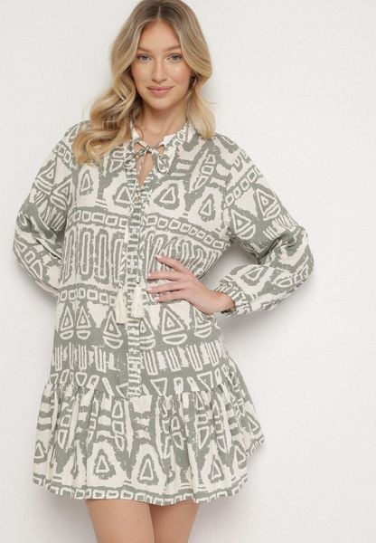 Zielona Wiskozowa Sukienka w Etniczny Wzór o Rozkloszowanym Kroju z Wiązaniem Nalpio. Zielone sukienki Born2be, na co dzień, l, bez wzorów, z materiału, eleganckie, bez kołnierzyka, bez ramiączek, rozkloszowane. Za 109.99 zł.