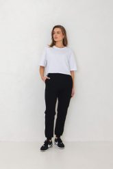SPODNIE CELINE CZARNE S - Flawless. Czarne spodnie dresowe Flawless, bez wzorów, z bawełny, klasyczne. Za 299.00 zł.