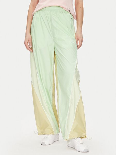 Adidas by Stella McCartney Spodnie dresowe JI5134 Zielony Loose Fit. Zielone spodnie dresowe adidas by Stella McCartney, bez wzorów, z dresówki. Za 449.99 zł.