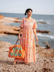 Isla Bonita by SIGRIS Sukienka w kolorze pomarańczowym rozmiar: XL. Pomarańczowe sukienki Isla Bonita by SIGRIS, na co dzień, xl, bez wzorów, z bawełny, bez kołnierzyka, bez ramiączek, maxi, proste. Za 189.29 zł.