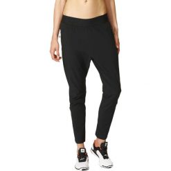 Adidas Spodnie damskie Z.N.E. Woven Pant czarny r. L (S94577). Spodnie dresowe marki bonprix. Za 215.77 zł.