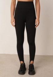Czarne Gładkie Legginsy z Wysokim Stanem i Zapiętkami Nimesa. Czarne legginsy Born2be, bez wzorów, z jeansu, sportowe. Za 69.99 zł.