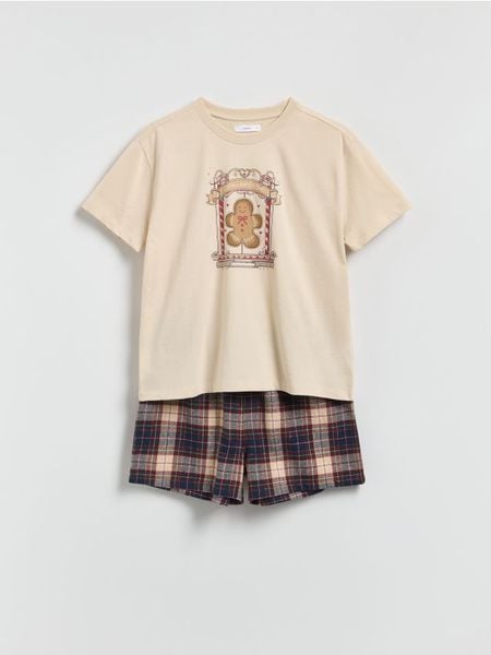 Piżama ze świątecznym motywem - granatowy. Niebieskie piżamy Reserved, l, bez wzorów, z bawełny, bez kołnierzyka, bez ramiączek. Za 99.99 zł.