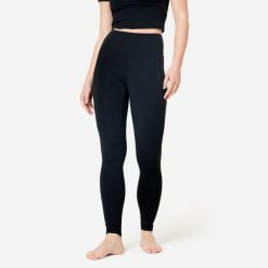 Legginsy do jogi i pilatesu Breathe. Czarne legginsy DOMYOS, bez wzorów, z elastanu, sportowe. Za 119.99 zł.