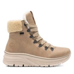 Botki Rieker. Brązowe botki Rieker, bez wzorów, bez obcasa, na płaskiej podeszwie, bez zapięcia. Za 303.99 zł.