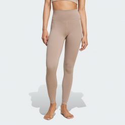 Legginsy All Me 7/8. Brązowe legginsy adidas, bez wzorów, z materiału, sportowe. Za 279.00 zł.