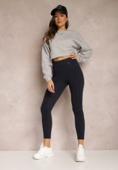 Granatowe Legginsy z Kieszeniami Anomi. Niebieskie legginsy Renee, bez wzorów, z dzianiny. W wyprzedaży za 44.99 zł.