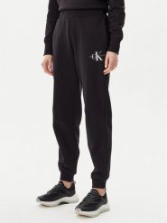 Calvin Klein Jeans Spodnie dresowe Monologo J20J225354 Czarny Slim Fit. Czarne spodnie dresowe Calvin Klein Jeans, bez wzorów, z bawełny. Za 239.99 zł.