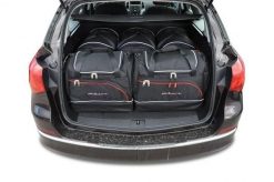Torby Do Bagażnika Opel Astra Tourer 2010-2015 5Szt Kjust. Czarne torby podróżne KJUST, bez wzorów, z kauczuku. Za 1,529.00 zł.