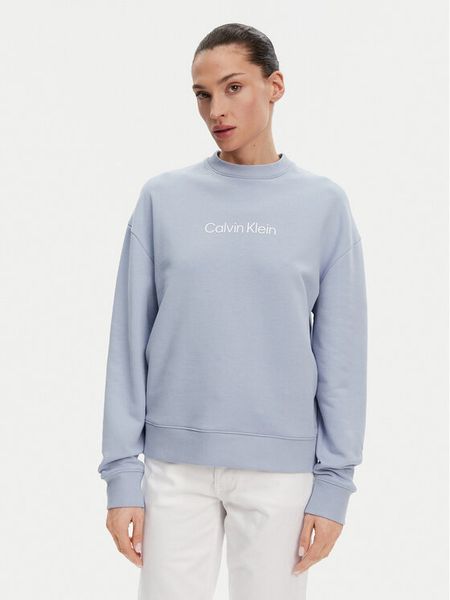 Calvin Klein Bluza Hero Logo K20K205450 Błękitny Regular Fit. Niebieskie bluzy Calvin Klein, s, bez wzorów, z bawełny, bez ramiączek, bez kaptura. Za 239.99 zł.