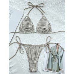Bikini trójkątne z regulowanymi wiązaniami na plażę Tarana. Czarne bikini Intica, bez wzorów, wakacyjne. W wyprzedaży za 149.00 zł.