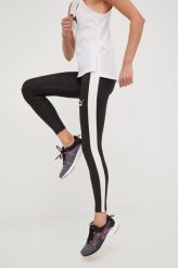 Puma legginsy damskie kolor czarny wzorzyste. Czarne legginsy Puma, bez wzorów, z dzianiny. W wyprzedaży za 144.99 zł.
