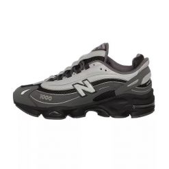 Buty New Balance M 1000 MEG Szare. Szare buty do biegania New Balance, bez wzorów, z materiału, bez zapięcia, do biegania. Za 752.80 zł.