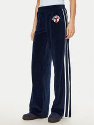 Tommy Jeans Spodnie dresowe Velvet DW0DW20542 Niebieski Regular Fit. Niebieskie spodnie dresowe Tommy Jeans, bez wzorów, z bawełny. Za 329.99 zł.