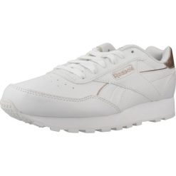 Tenisówki Reebok Model Rewind Run Kolor Biały. Białe trampki Reebok, bez wzorów, z materiału, bez zapięcia. Za 195.30 zł.