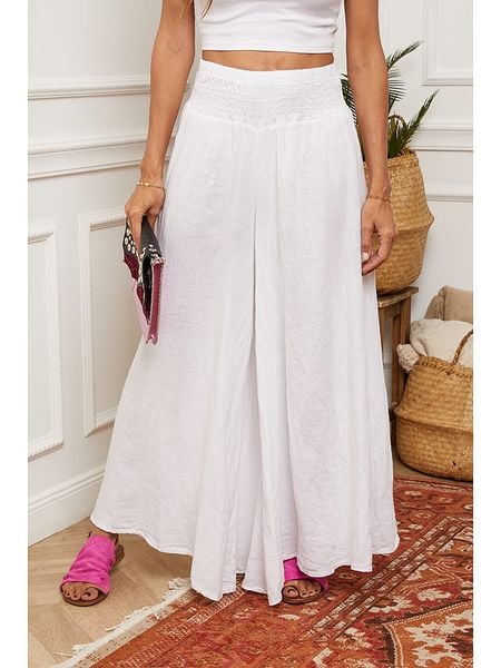 La Compagnie Du Lin Lniane spodnie "Dagor" w kolorze białym rozmiar: L. Białe spodnie materiałowe La Compagnie Du Lin, bez wzorów, ze lnu, z podwyższonym stanem. Za 184.46 zł.