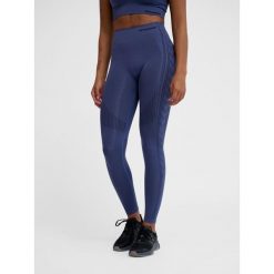 Damskie legginsy bezszwowe Hummel MT Shaping. Niebieskie legginsy Hummel, bez wzorów, sportowe. Za 143.00 zł.