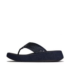 Klapki między palcami damskie FitFlop F-Mode. Niebieskie klapki FIT FLOP, bez wzorów, z materiału, eleganckie, bez obcasa, bez zapięcia. Za 592.00 zł.