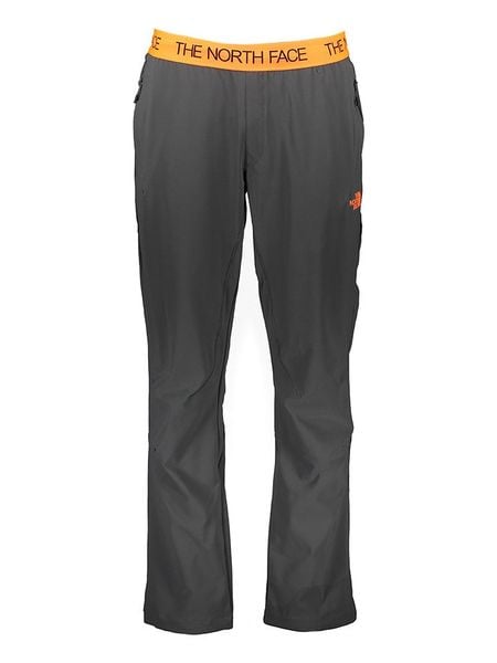 The North Face Spodnie funkcyjne w kolorze szaro-pomarańczowym rozmiar: L. Pomarańczowe spodnie dresowe The North Face, bez wzorów. Za 271.03 zł.