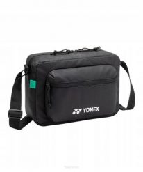 Saszetka sportowa Yonex Team Shoulder Bag. Czarne nerki i saszetki YONEX, bez wzorów, z syntetyku, sportowe, bez dodatków. Za 109.00 zł.