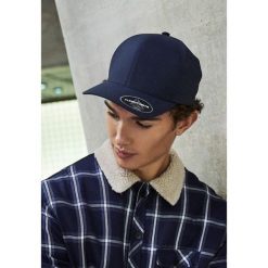 Czapka Flexfit delta Adjustable. Niebieskie czapki z daszkiem FLEXFIT, bez wzorów. Za 166.50 zł.