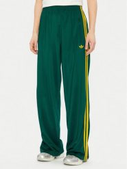 Adidas Spodnie dresowe adicolor Classic Firebird JP2314 Zielony Loose Fit. Zielone spodnie dresowe adidas, bez wzorów, z dresówki. Za 219.99 zł.