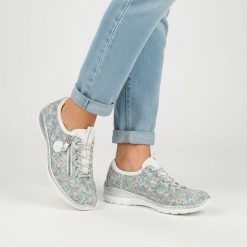 Półbuty damskie Rieker, cholewka materiałowa z nadrukiem kwiatowym wsuwane na płaskiej podeszwie, multikolor, L3252-91. Półbuty wsuwane Rieker, w ażurowe wzory, z jeansu, biznesowe, bez obcasa, na płaskiej podeszwie. Za 359.00 zł.