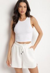 Biały Krótki Tank Top z Prążkowanej Tkaniny Nevallia. Białe topy Born2be, l, bez wzorów, z jeansu, eleganckie, bez kołnierzyka, bez ramiączek. Za 29.99 zł.