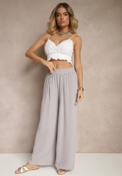 Szare Spodnie z Bawełną o Szerokim Kroju High Waist Ozdobione Guzikami Morritia. Szare jeansy Renee, bez wzorów, z bawełny, eleganckie, z podwyższonym stanem. W wyprzedaży za 29.99 zł.