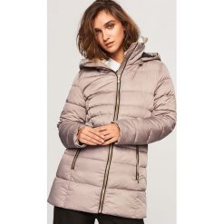 Pikowana kurtka - Beżowy. Kurtki marki QUECHUA. W wyprzedaży za 149.99 zł.