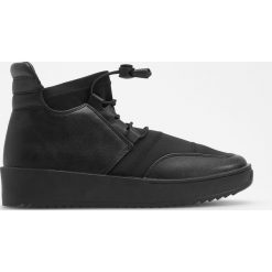 Sportowe buty za kostkę - Czarny. Buty treningowe marki DOMYOS. W wyprzedaży za 79.99 zł.