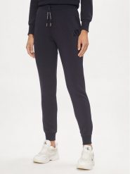 Armani Exchange Spodnie dresowe 3DYP79 YJEPZ 1593 Granatowy Regular Fit. Niebieskie spodnie dresowe Armani Exchange, bez wzorów, z dresówki. Za 589.99 zł.
